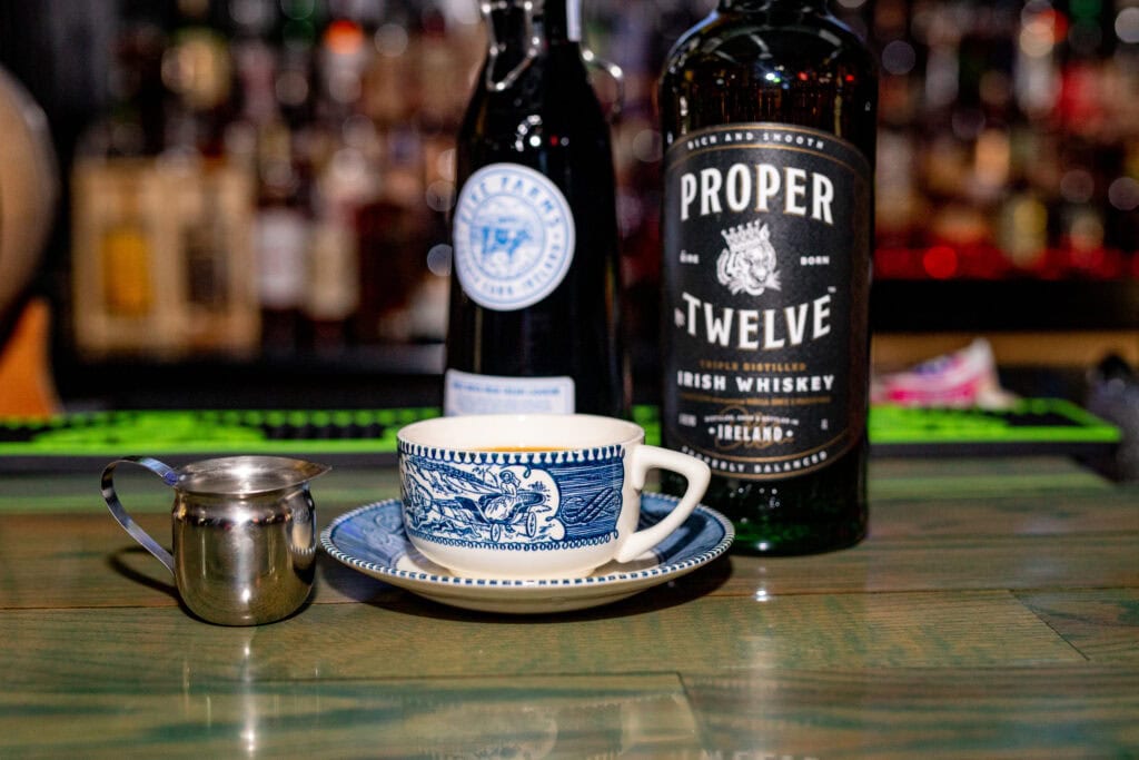 Proper Twelve Irish Whiskey at Dive Bar Como Hot Toddy Cocktail