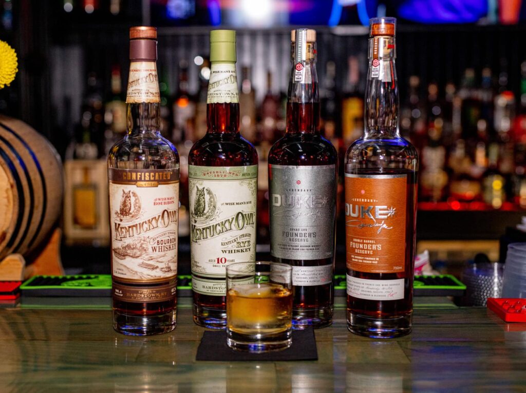 whiskeys at Dive Bar Como on the bar