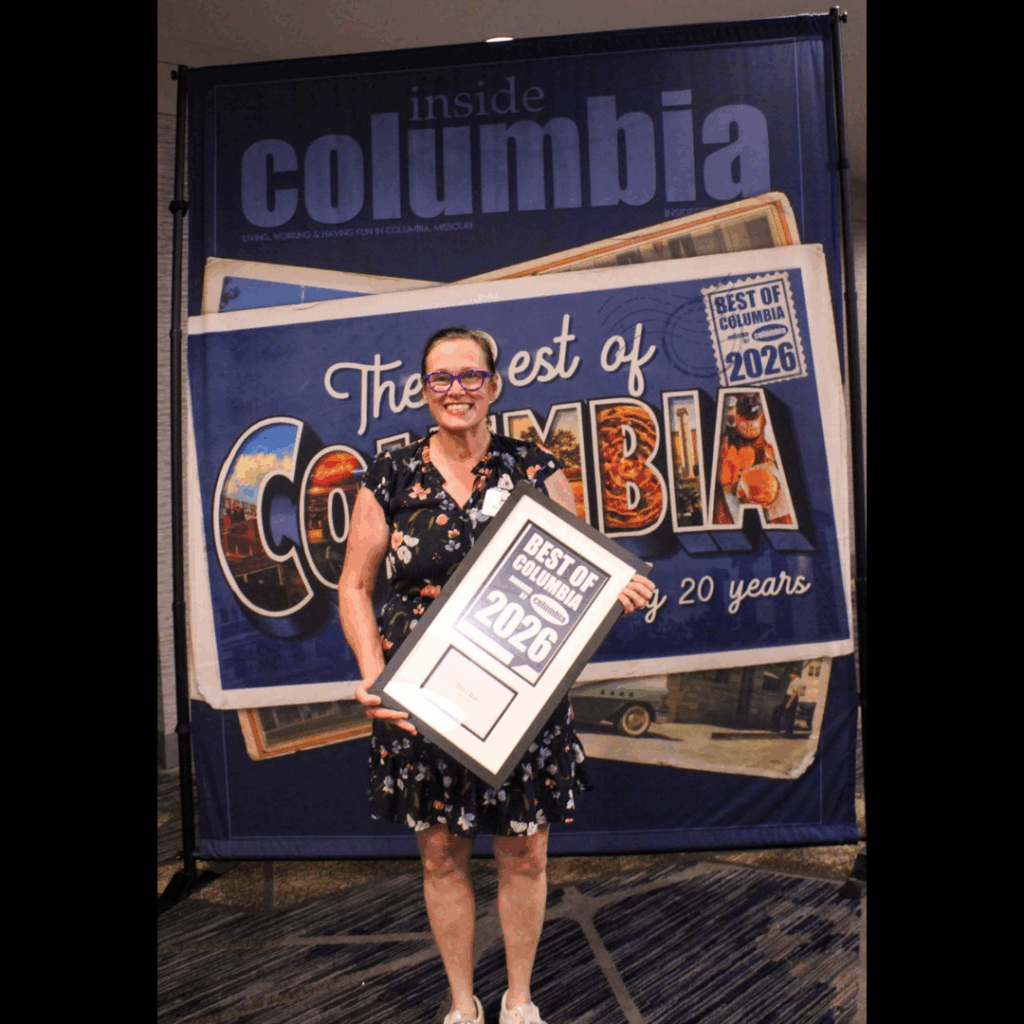Karen accepting Dive Bar's best of Columbia award for best bar.